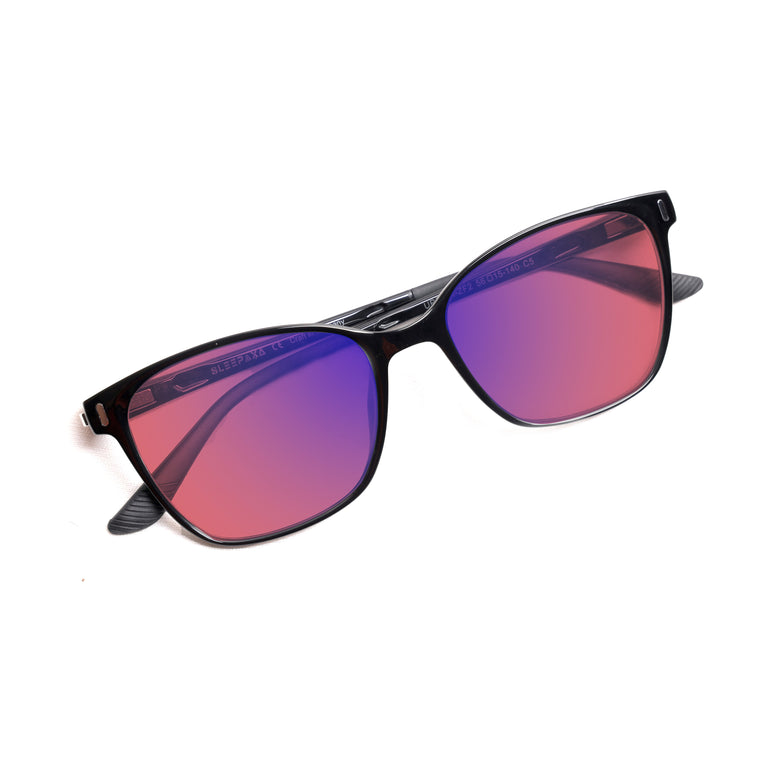 Top View of Sleepaxa Clarte FL41 Migraine & Light Sensitivity glasses with Cat Eye Shape Black frame, rose-tinted lenses, and high-quality tr90 temples for optimal comfort and durability