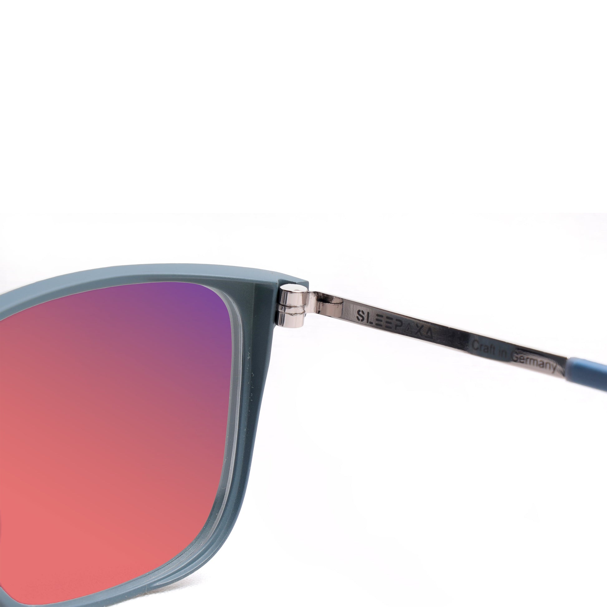 Side view of Sleepaxa Elegan fl41 glasses with slate blue frame, rose tinted lenses, metal temples, and long TR90 earpieces for enhanced comfort